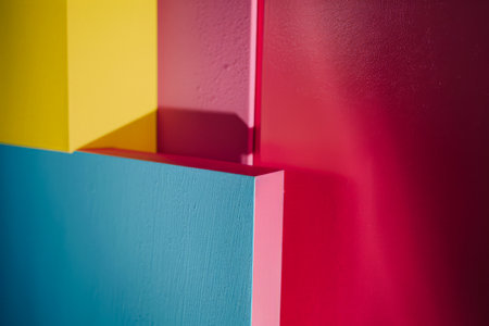 Vibrant minimalist home decor in contrasting colors. Interior design composition with high contrasts and shadows.の素材