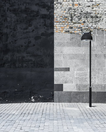 Empty street with minimalist architecture and contrasting tones.の素材