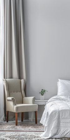 Modern hotel room with elegant bedding and stylish decor. Neutral tones and use of natural light.の素材