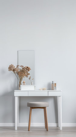 Modern minimalist dressing table in an empty room bathed with natural lighting. Home decor minimalist composition in neutral tonality.の素材