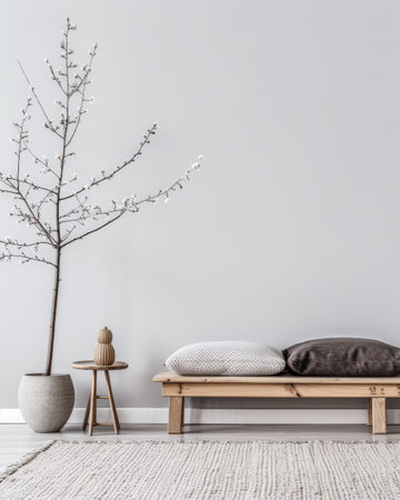 Minimalist zen living room interiors in neutral colors with natural lighting coming from a window. Residential interior design composition for Real Estate.の素材