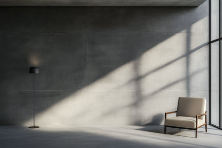 Minimalist living room composition with a sofa, a lamp and a table against a large concrete grey wall. Brutalist interior design composition with copyspaceの素材