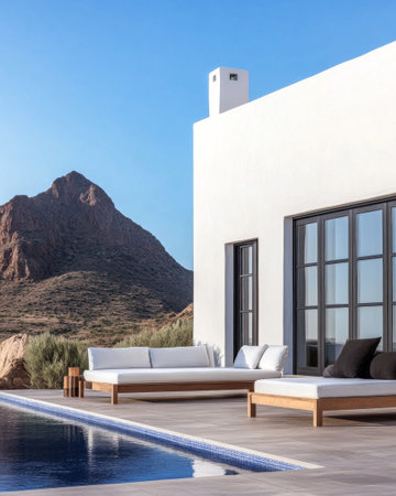 This stylish outdoor lounge features comfortable seating and a tranquil pool, providing a perfect spot for relaxation while enjoying picturesque mountain views.の素材