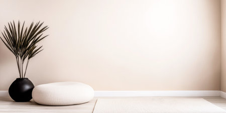 A spacious, minimalistic room showcases a large round cushion and a tall potted plant against a light-colored wall, creating a serene atmosphere perfect for relaxation.の素材