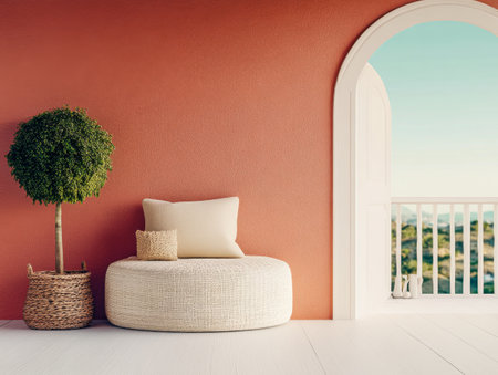A stylish and inviting interior features a round seating area and a decorative plant beside an arched doorway that opens to a beautiful outdoor landscape.の素材