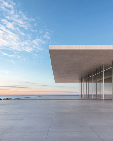 A contemporary structure with a flat roof features large glass panels, providing stunning views of the ocean at sunset, creating a serene atmosphere in an idyllic coastal setting.の素材