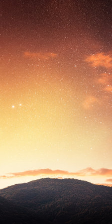 A stunning view of a vibrant night sky showcasing twinkling stars and two bright celestial bodies. Below the silhouettes of mountains contrast against the colorful dusk horizon.の素材