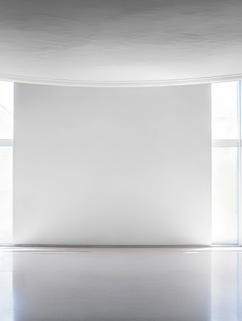 A bright minimalist room features smooth white walls and expansive windows that bring in natural light. The empty space offers a calm and airy ambiance perfect for creativity.の素材