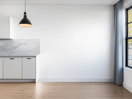 Bright modern kitchen featuring a sleek white cabinetry and marble backsplash. Sunlight streams through a large window illuminating the spacious room.の素材