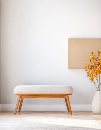 A minimalist interior showcases a light wooden bench in front of a neutral wall. A vase with yellow flowers adds a warm touch to the serene atmosphere of the room.の素材