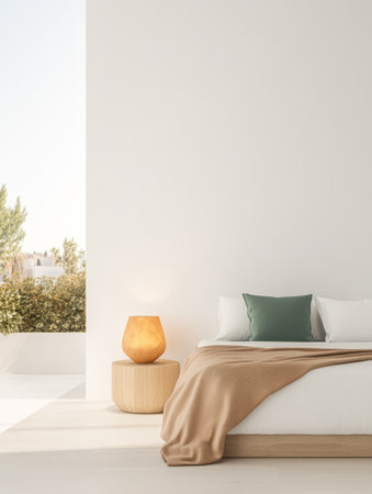 A minimalist bedroom features a soft beige blanket and green pillows on the bed. Natural light floods the space through large windows illuminating a peaceful balcony garden.の素材