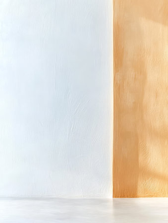 A stylish interior features two contrasting wall colors one white and the other a warm beige. The smooth surfaces create a contemporary atmosphere enhancing the minimalist design.の素材