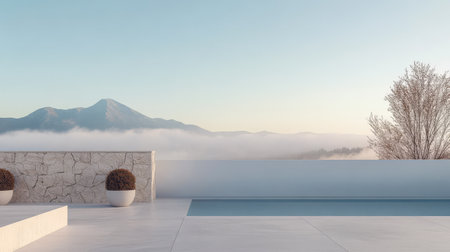 A tranquil outdoor space features a sleek design with a pool and stone wall overlooking a mountain shrouded in morning mist. Soft sunlight brightens the serene atmosphere.の素材
