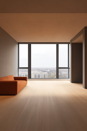 A contemporary living room with minimalistic decor showcases an orange couch positioned against a large window. The view reveals an expansive urban landscape enhancing the space's openness.の素材