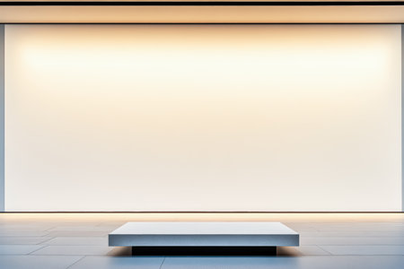 A spacious modern gallery features a minimalist display platform centered under soft lighting. The clean white walls enhance the serene atmosphere inviting contemplation.の素材