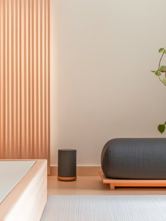 A cozy interior features minimalistic furniture with muted colors showcasing a sleek speaker a plush seating cushion and a small potted plant creating a calm and inviting space.の素材