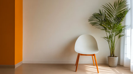 A simple and modern interior showcases a white chair with wooden legs beside a lush potted plant against a neutral wall. Warm orange accents add vibrancy to the space.の素材