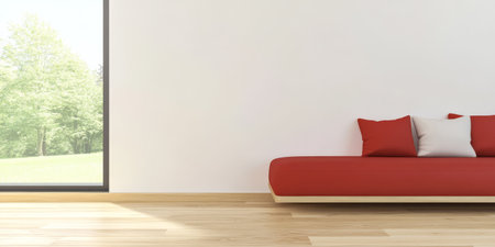 A modern living room features a bold red sofa adorned with three decorative pillows.の素材