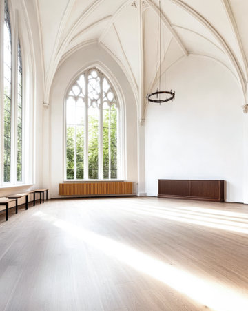 A bright interior features high ceilings and large windows that allow natural light to flood the room. Simple furnishings provide an open and airy atmosphere ideal for gatherings or events.の素材