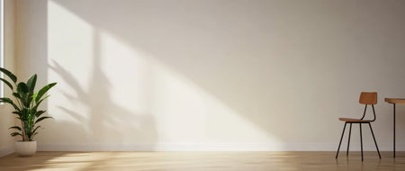 Sunlight streams through a window casting shadows on a bare wall in a minimalist room featuring a plant simple chair and a small table creating a serene atmosphere.の素材