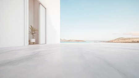 Bright and airy indoor space featuring a simple design with a potted plant. Large windows open to a tranquil coastal landscape under a clear blue sky ideal for relaxation.の素材
