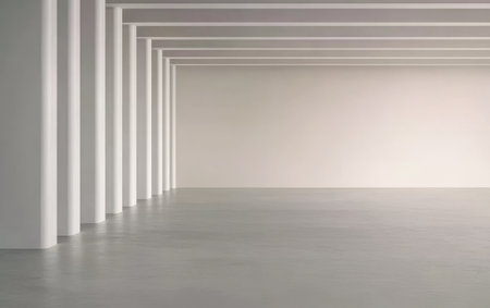 A spacious area featuring smooth concrete flooring and clean white walls. The design emphasizes simplicity with evenly spaced pillars and an expansive uncluttered feeling.の素材
