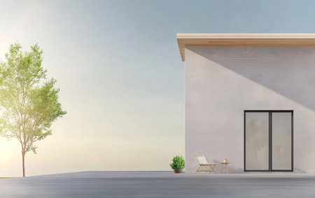 A minimalist house stands against a serene sky during sunrise. The structure features large glass doors complemented by a small chair and potted plant on the patio creating a tranquil outdoor space.の素材