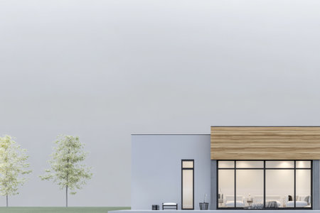 A contemporary house showcases large windows and wooden accents set against a calm, muted sky. Lush green trees frame the clean lines of the structure in an inviting outdoor space.の素材