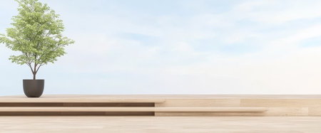A minimalist outdoor area showcases a potted tree next to wooden steps. The serene setting highlights clean lines and natural elements under a clear sky, creating a tranquil atmosphere.の素材