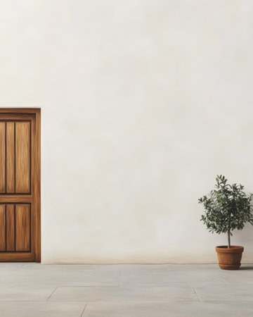 In a bright, minimalist environment, a beautifully crafted wooden door stands against a plain wall. A small potted plant adds a touch of greenery, enhancing the tranquil atmosphere.の素材