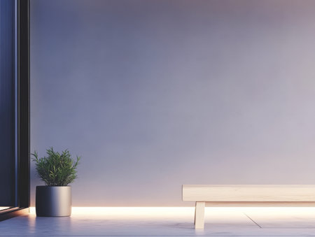 A sleek wooden bench sits against a soft blue wall, illuminated by gentle lighting. A potted plant adds a touch of nature, enhancing the tranquil ambiance of the space.の素材