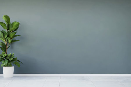 A stylish room showcases a large green plant in a white pot beside a smooth grey wall. The polished floor enhances the contemporary aesthetic of the space.の素材