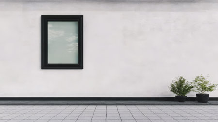 A minimalist courtyard features a sleek window framed in black. Two potted plants add a touch of greenery to the gray tiled area, complementing the clean white wall under bright daylight.の素材