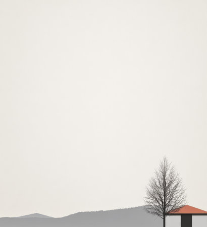 A tranquil winter morning showcases a solitary tree next to a gazebo. The background features distant hills, creating a serene atmosphere under the pale sky.の素材