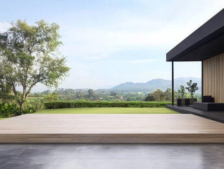 A sleek wooden deck overlooks a lush green landscape and distant mountains, creating a tranquil atmosphere. The modern structure features a shaded seating area, perfect for relaxation.の素材