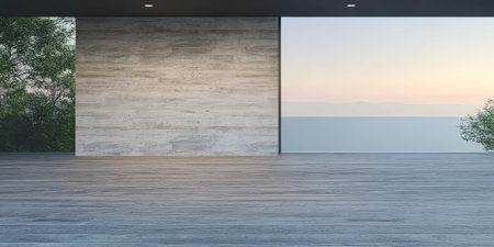 A minimalistic interior room merges with outdoor views at dawn, featuring a smooth concrete wall and expansive windows. Soft light bathes the wooden floor, creating a serene atmosphere.の素材
