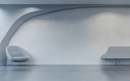 A spacious interior area showcases modern minimalist design with soft gray walls and unique curved furniture. Comfortable seating invites relaxation in the serene environment.の素材