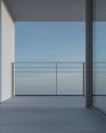 A contemporary balcony features minimalist design elements like clean lines and sleek railings. The space opens up to a vast clear blue sky creating a serene outdoor atmosphere.の素材
