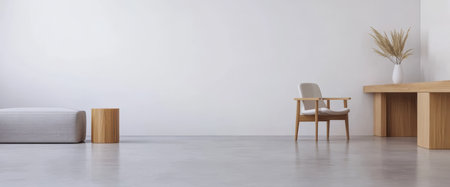 A spacious interior showcases a minimalist design with a wooden desk a chair and decorative elements. The light colors create an inviting atmosphere perfect for work or relaxation.の素材