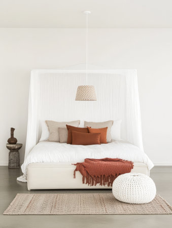 This serene bedroom showcases a minimalist design with a comfortable bed dressed in white linens accented by warm-colored pillows and a stylish hanging lamp. A textured rug completes the look.の素材