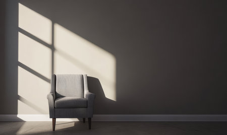 A stylish armchair sits in a minimalist room illuminated by soft sunlight streaming through a window. The neutral wall complements the chair creating a serene atmosphere.の素材