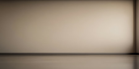 A spacious room features a plain softly lit wall and a smooth floor. The minimalist design provides an ideal setting for artistic projects or renovations emphasizing openness and potential.の素材