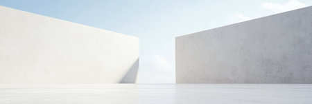 Two stark white walls create a minimalist space with a smooth floor reflecting the bright sky. The open area conveys a sense of calm and invites contemplation.の素材