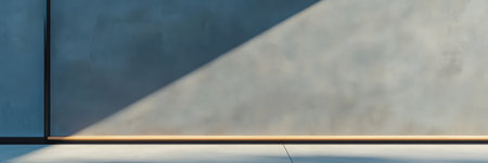 This setting showcases a minimalist wall with a sleek smooth surface and dramatic shadows created by natural light. The composition emphasizes simplicity and elegance in design.の素材