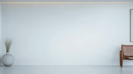 A spacious room features a blank wall complemented by a stylish chair and a decorative vase. The minimalist design highlights simplicity and elegance in a calm setting.の素材