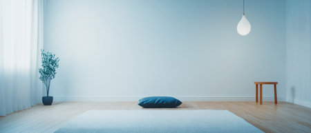 A spacious minimalistic room featuring a soft blue cushion on a plush rug a small wooden table and a single plant all illuminated by soft natural light streaming through the curtains.の素材