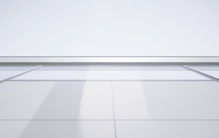 Innovative building design showcases clean lines and glass elements reflecting sunlight in a contemporary urban environment. The minimalist style emphasizes functionality and aesthetics.の素材
