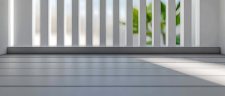 Outdoor space features sleek wooden flooring and vertical slats allowing glimpses of green plants while creating a peaceful contemporary atmosphere perfect for relaxation.の素材