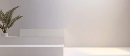 A bright minimalist space featuring a clean white background and sleek furniture. A potted green plant adds a touch of nature enhancing the tranquility of the setting.の素材