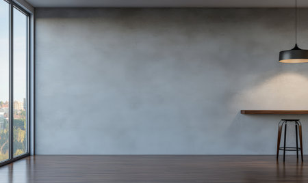 A bright workspace featuring a wooden bar table next to a large window. The room has minimalist decor with exposed concrete walls and a stylish hanging light creating an inviting atmosphere.の素材